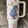 Cute bunny design thermos with floral patterns for kids.