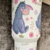 Cute donkey with floral design, perfect for peaceful themes.