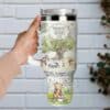 Colorful Winnie the Pooh themed travel mug with classic illustrations.