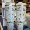 Personalized Chihuahua-themed travel mug with hibiscus design.