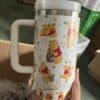 Cute Winnie the Pooh themed ceramic mug for coffee or tea lovers.