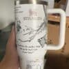 Versatile white travel mug with Marvel logo and inspirational quote about small things in life.