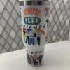 Friends-themed travel tumbler with colorful "Friends" TV show characters.