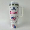 Cute Stitch and Angel Bunny cartoon design travel mug, perfect for fans.