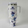 Durable insulated vacuum mug with Stitch design.