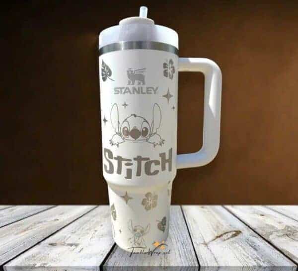 Insulated Disney Stitch water bottle featuring Stitch graphic and tropical leaves.