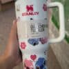 Colorful kids mug with Disney characters and floral designs, 40 OZ.