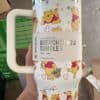 Winnie the Pooh-themed stainless steel tumbler featuring adorable bear illustrations.
