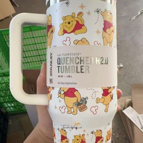Winnie the Pooh-themed stainless steel tumbler featuring adorable bear illustrations.