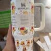 Colorful Winnie the Pooh themed coffee mug with peaceful illustrations.