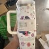 Colorful floral and horse-themed insulated tumbler for hydration.
