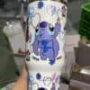 Cute Stitch cartoon design on a travel tumbler for peace and love.