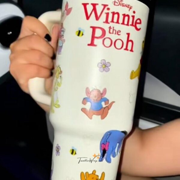 Cute Winnie the Pooh themed travel mug for Disney fans.