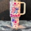 Colorful Stitch and Lilo cartoon mug design for fans.