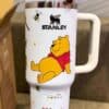 Bee and Stanley logo on Winnie the Pooh mug, perfect for Disney fans and cute home decor.