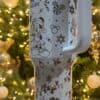 Decorative Disney-themed holiday Starbucks mug for Christmas.