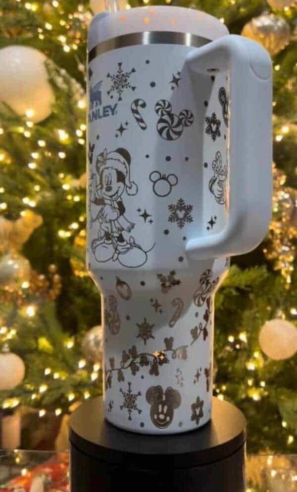 Decorative Disney-themed holiday Starbucks mug for Christmas.