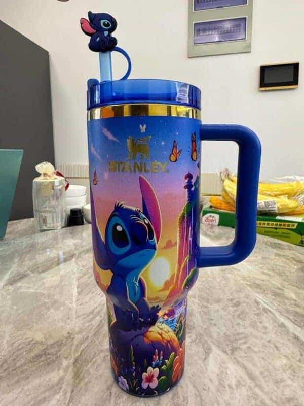 Colorful Lilo & Stitch themed travel mug with Disney design.