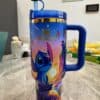 Colorful Stitch-themed travel mug with Disney logo.