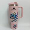 Stitch Halloween design on pink travel tumbler, Disney character mug for fans.