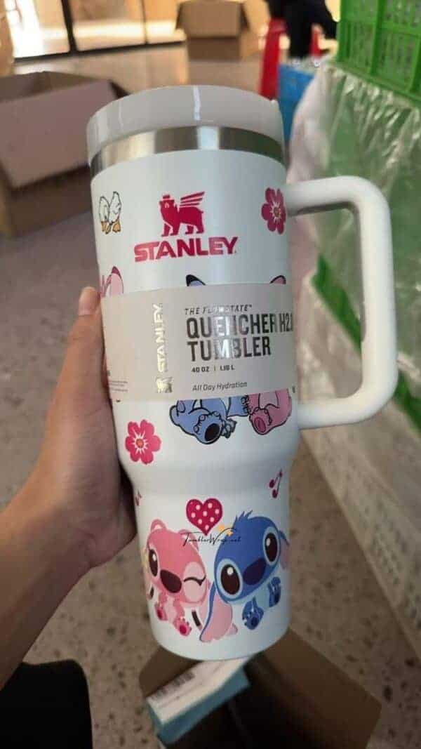 Colorful cute animal tumbler with Hello Kitty and floral design.