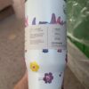 Cute unicorn printed tumbler cup with colorful flowers.