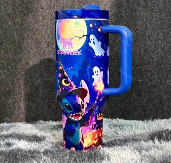 Colorful Halloween-themed travel mug with ghosts, pumpkins, and Stitch in a witch hat.