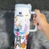 Cute Halloween themed coffee mug with spooky graphics.