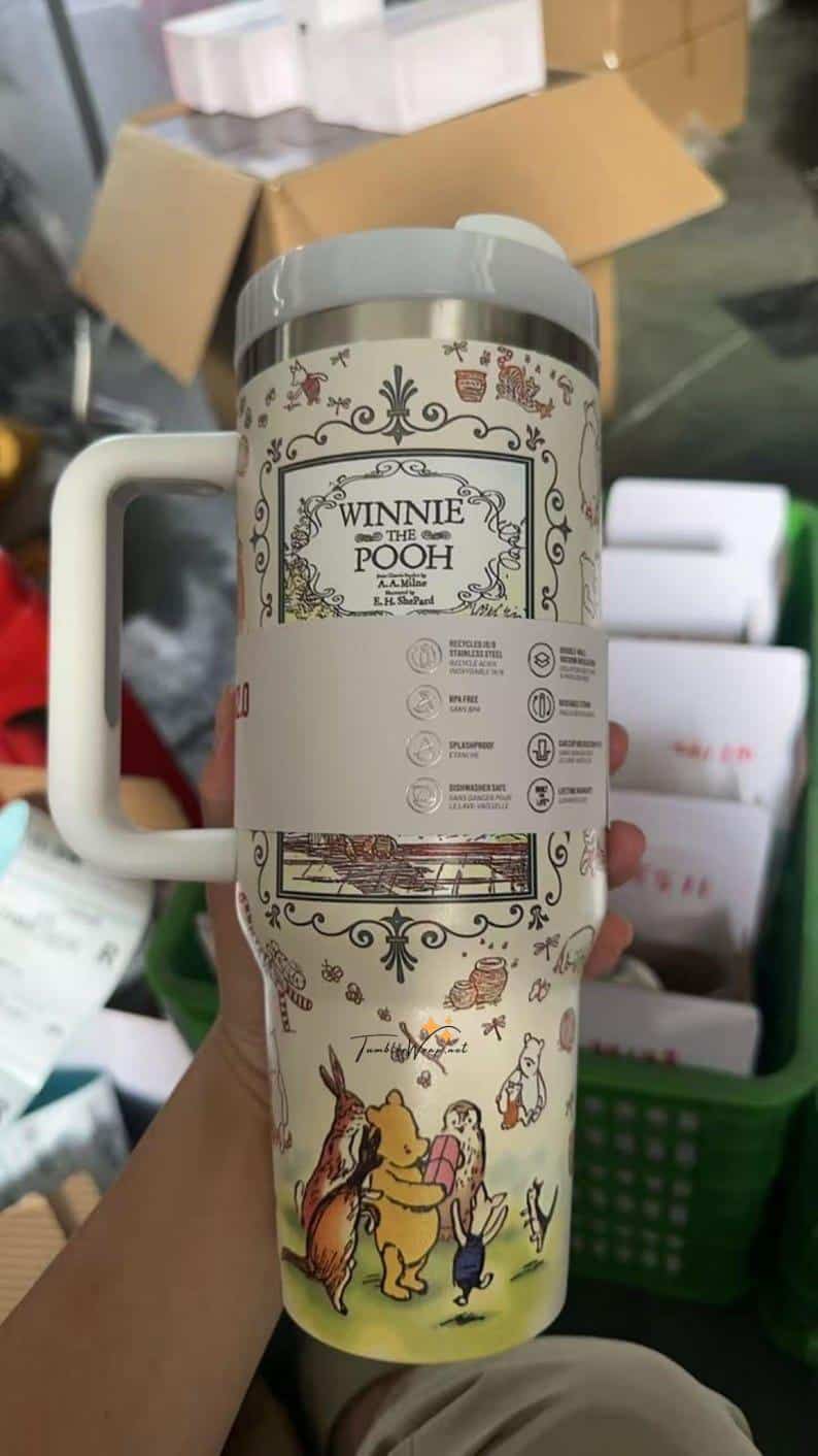 Winnie the Pooh-themed mug with classic characters and design.