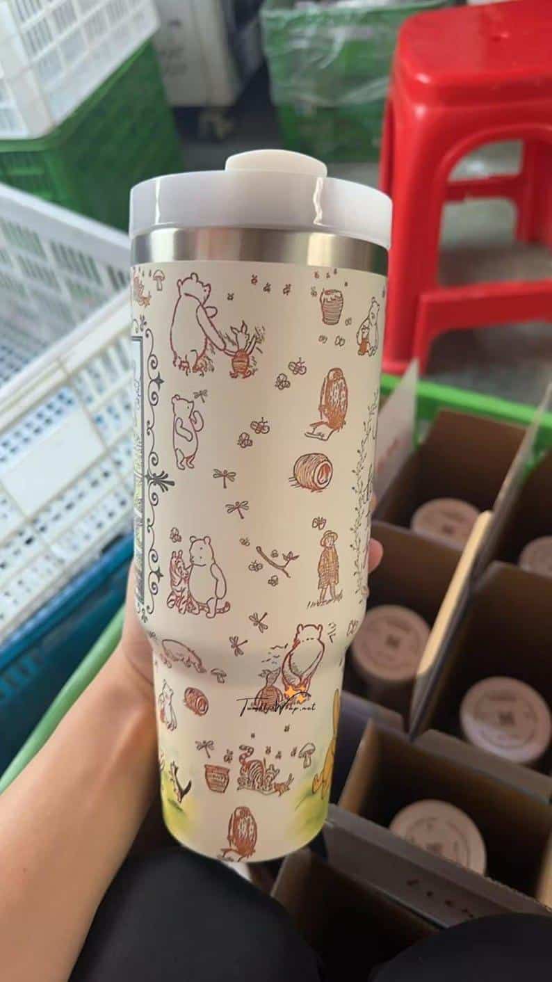 Travel mug with cute bear, owl, and nature illustrations for coffee lovers.