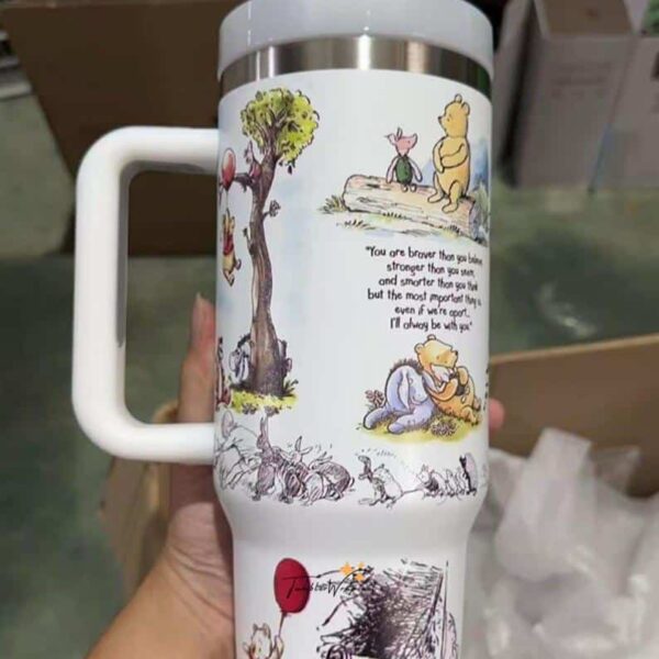 Bright mug featuring Winnie the Pooh and friends with inspiring quote.