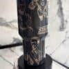 Detailed Iron Man and Star Wars artwork on black tumbler.