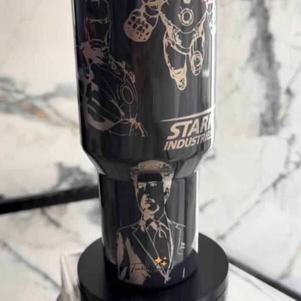 Detailed Iron Man and Star Wars artwork on black tumbler.