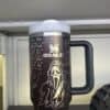 Coffee mug with horror-themed ghost design and quotes.
