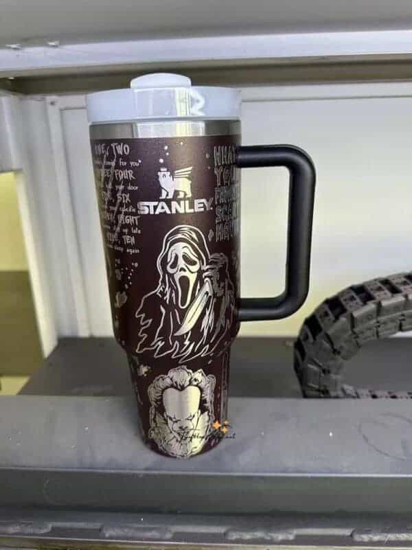 Slogan mug with horror-themed graphics.