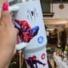 Large white tumbler featuring Spider-Man and black spider graphic design.