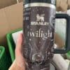 Alt text describing a large black and silver Twilight-themed Starbucks travel mug.