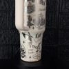 Decorative travel mug with peace, nature, and team-themed illustrations.