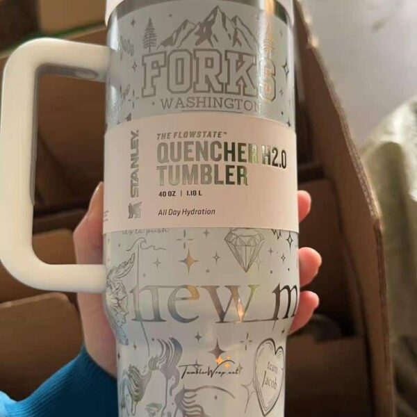Decorative ceramic mug with inspirational artwork and personalized message.