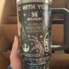 Star Wars-themed coffee mug featuring Darth Vader, R2D2, and Star Wars logo.
