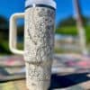 Stylish sailor-themed travel mug with intricate line art design.