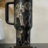 Detailed Star Wars themed black and silver tumbler with sci-fi design.