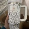Beautiful black and white unicorn-themed tea mug featuring moon, stars, and floral elements.