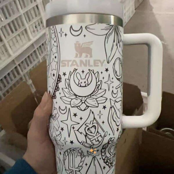 Beautiful black and white unicorn-themed tea mug featuring moon, stars, and floral elements.