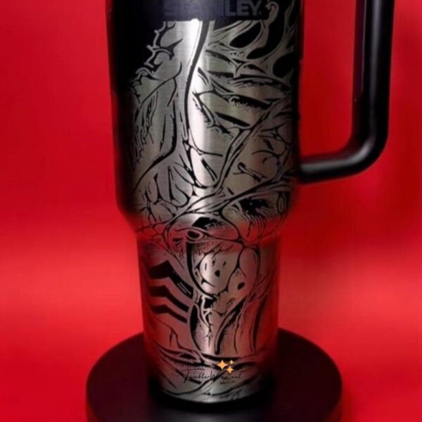 Decorative peace symbol coffee mug with artistic design.