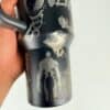Dark-themed venom graphic mug for fans.