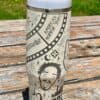 Reusable tumbler with peace-themed graphics and illustrations.