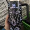 Cosmic peace theme with celestial elements on insulated tumbler.
