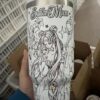 A white cylindrical container features Sailor Moon illustration, star details, and floral elements for coloring.