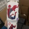 Spiderman tumbler cup featuring cartoon web-slinging superhero design.